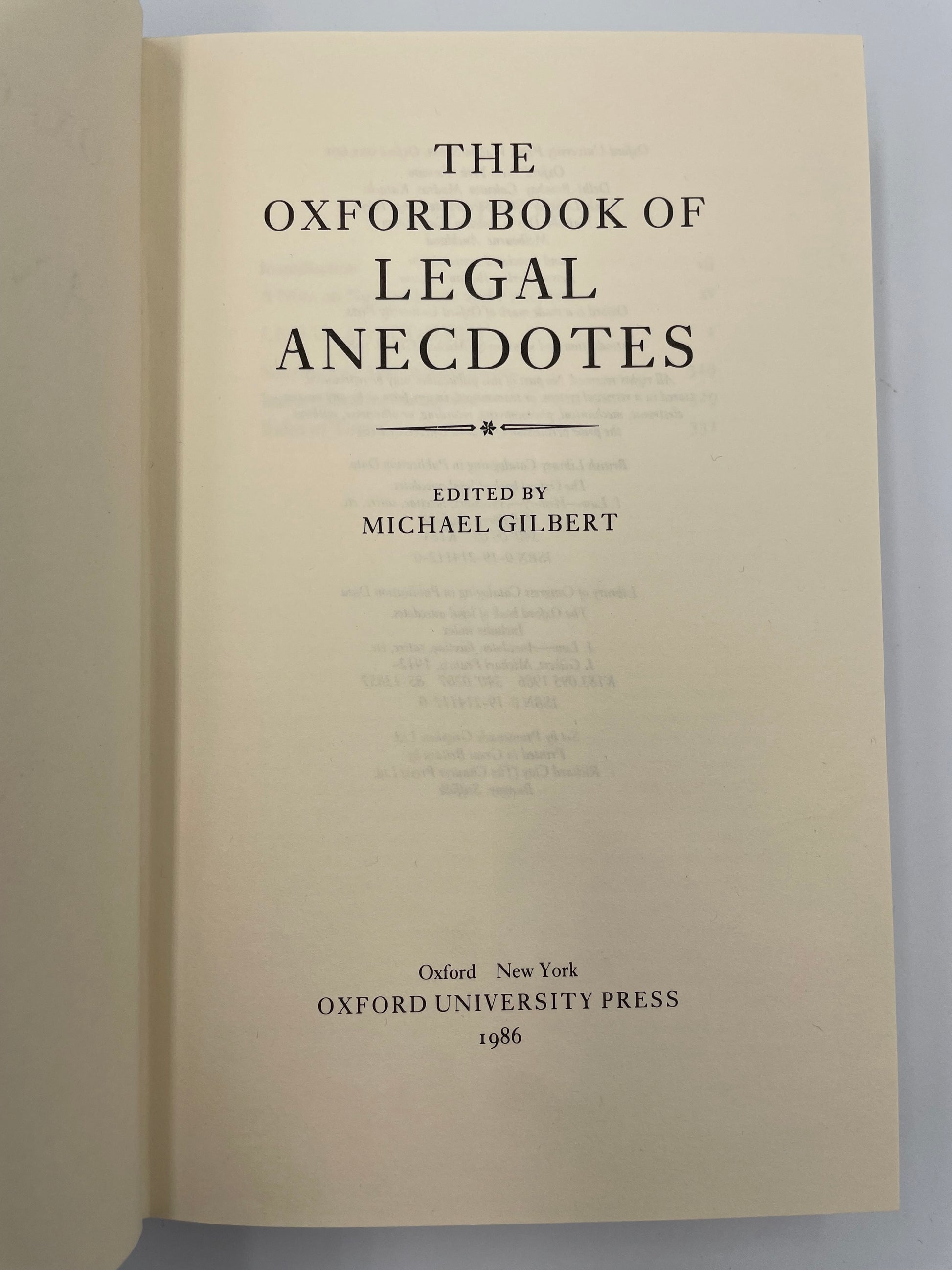 Title page from, 'The Oxford Book of Legal Anecdotes' by Oxford University Press on a light gray background.