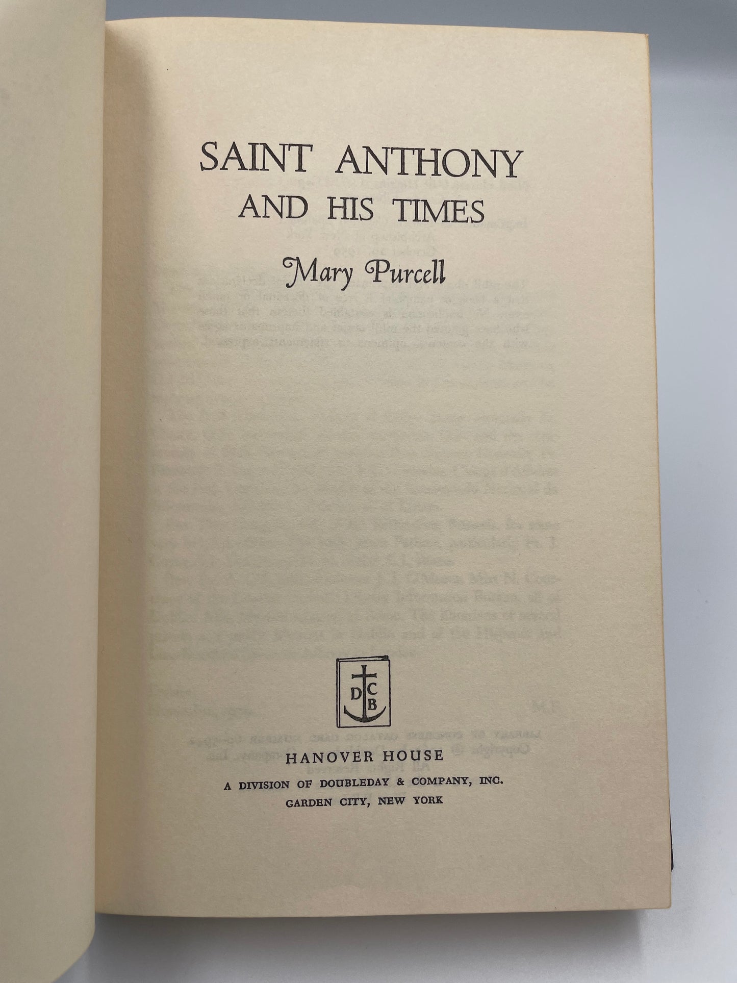 Book title page of 'Saint Anthony and His Times' by Mary Parcell with a visible publisher's logo on a light background.