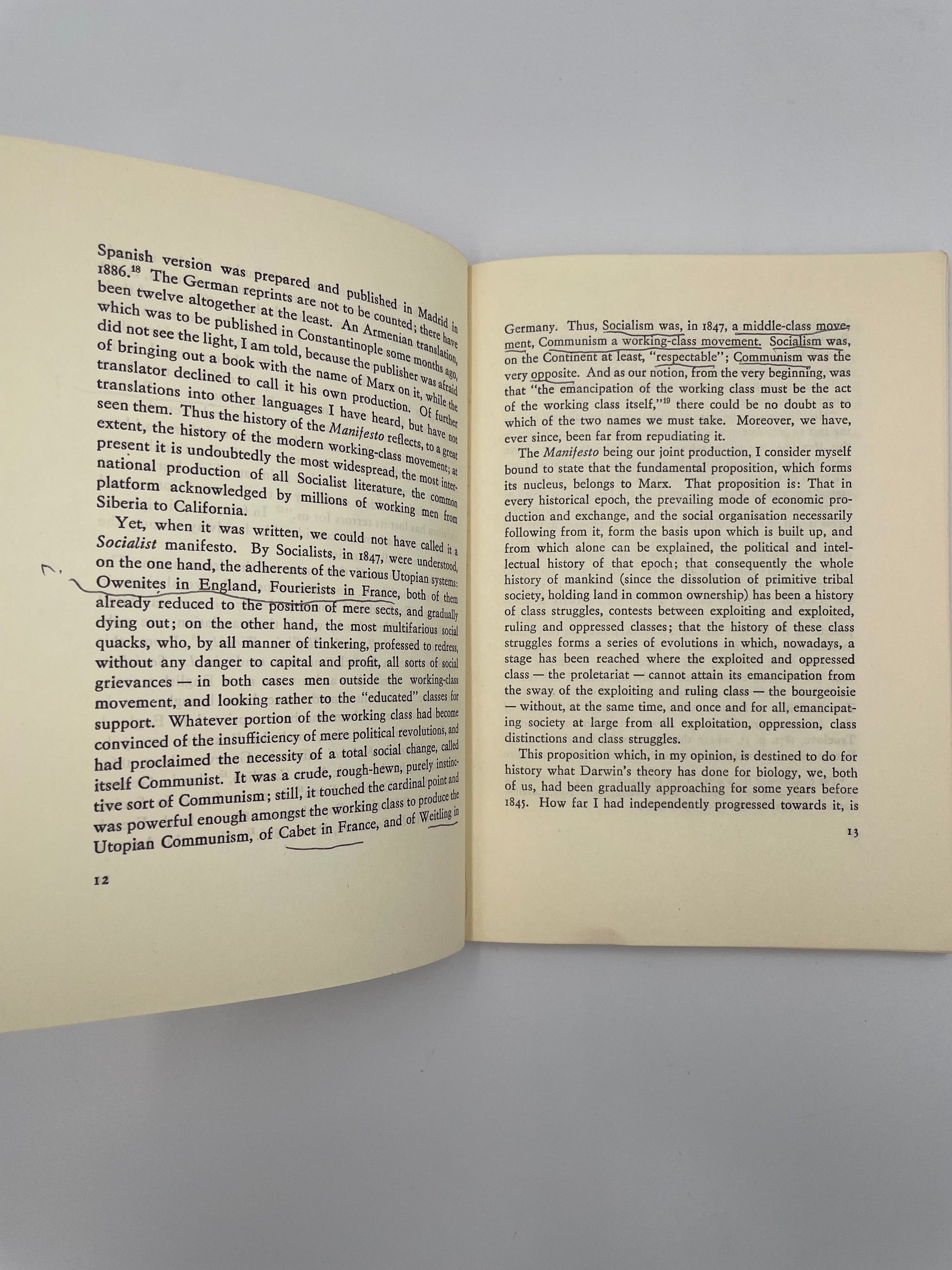 Pages 12,13 with underlines from Manifesto of the Communist Party by Karl Marx and Frederick Engels
