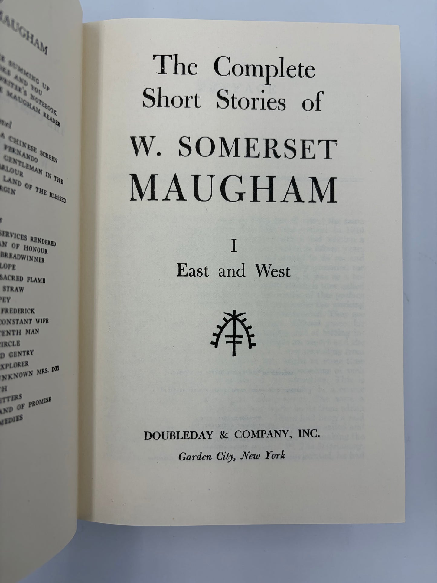 Open book showing the title page of 'The Complete Short Stories of W. Somerset Maugham' Volume 1  by Doubleday & Company, Inc.