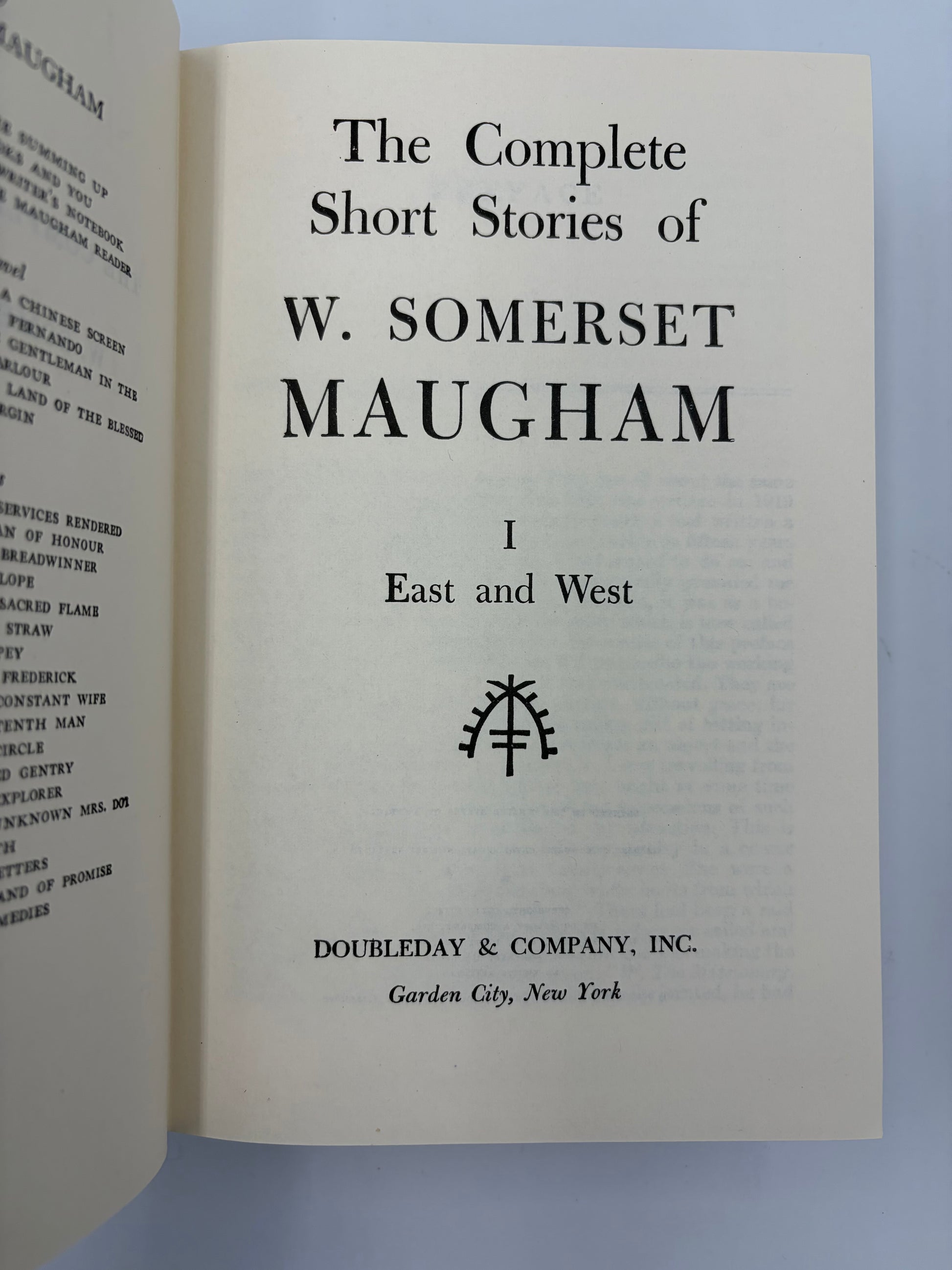 Open book showing the title page of 'The Complete Short Stories of W. Somerset Maugham' Volume 1  by Doubleday & Company, Inc.