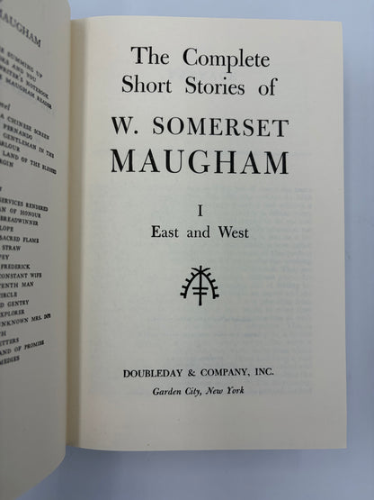 Open book showing the title page of 'The Complete Short Stories of W. Somerset Maugham' Volume 1  by Doubleday & Company, Inc.