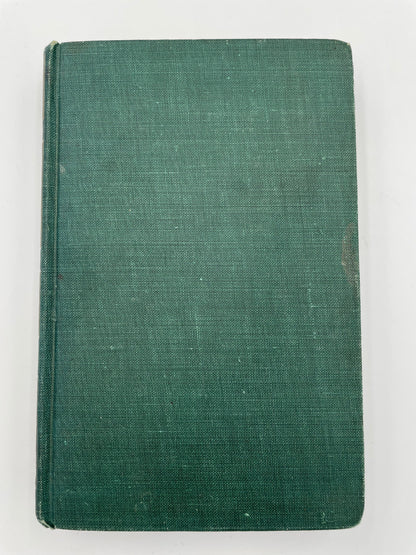 Green fabric book cover on a white background