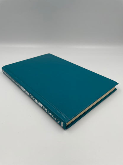 Book titled 'Teilhard de Chardin'.