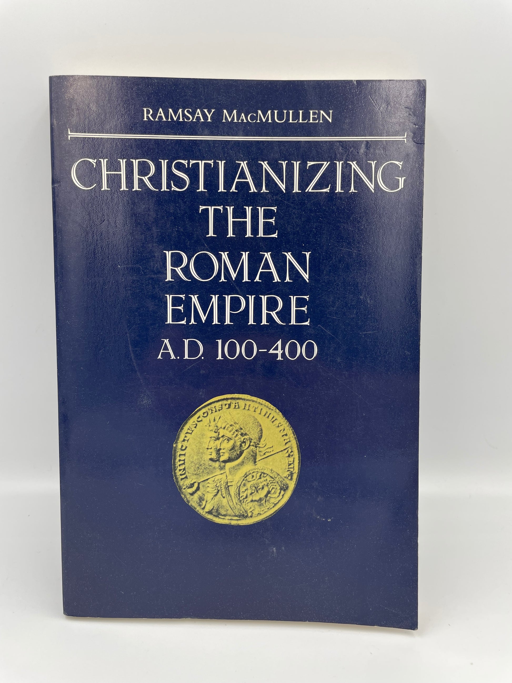 Book titled 'Christianizing the Roman Empire A.D. 100-400' by Ramsay MacMullen on a white background