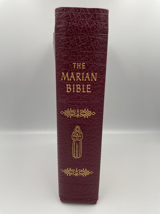 Leather bound bible  titled 'The Marian Bible' (spine view) 