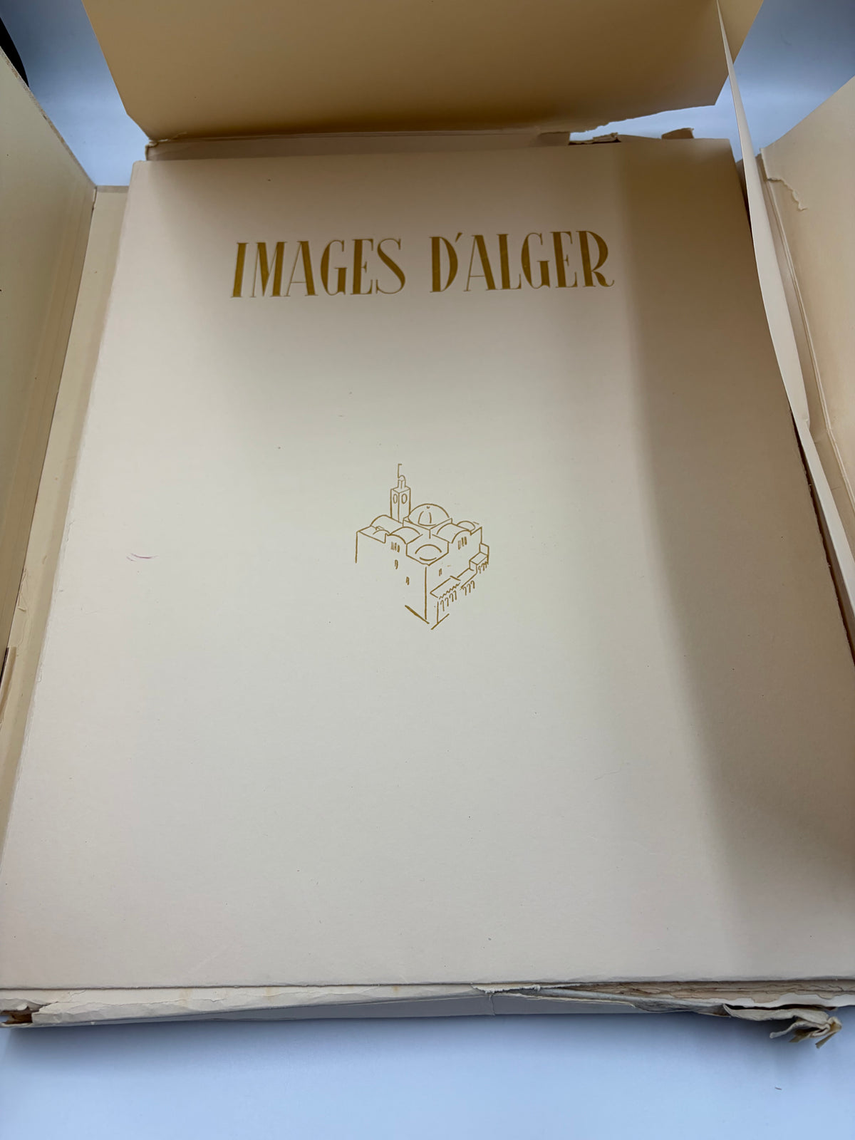 Open art portfolio with 'Images d'Alger' title.