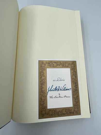 Page with ex Libris sticker on "The Mill on the Floss" by George Elliot.