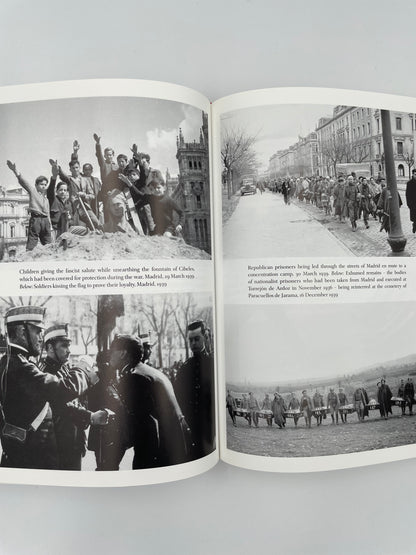 Open pages with photos from volume 2 of "The Spanish Civil War"by Hugh Thomas