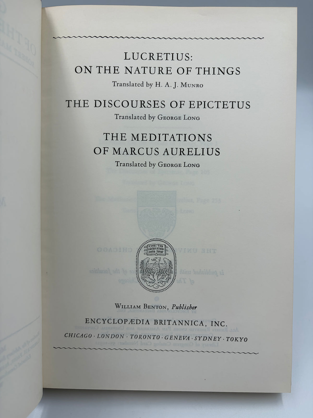 Title page of a printed edition for 'Lucretius: On the Nature of Things' and 'The Discourses of Epictetus' plus publisher text at the bottom.