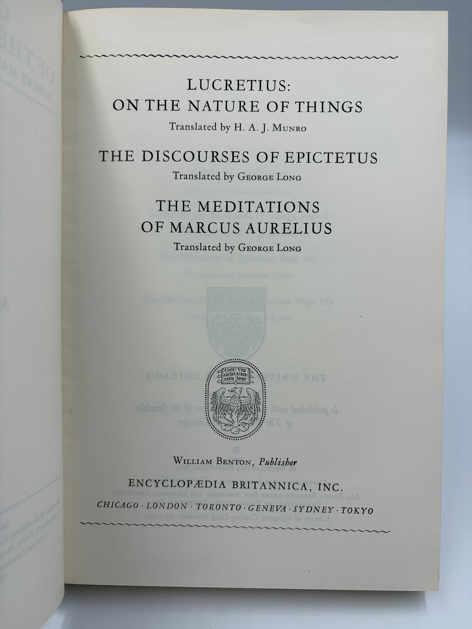 Title page of a printed edition for 'Lucretius: On the Nature of Things' and 'The Discourses of Epictetus' plus publisher text at the bottom.