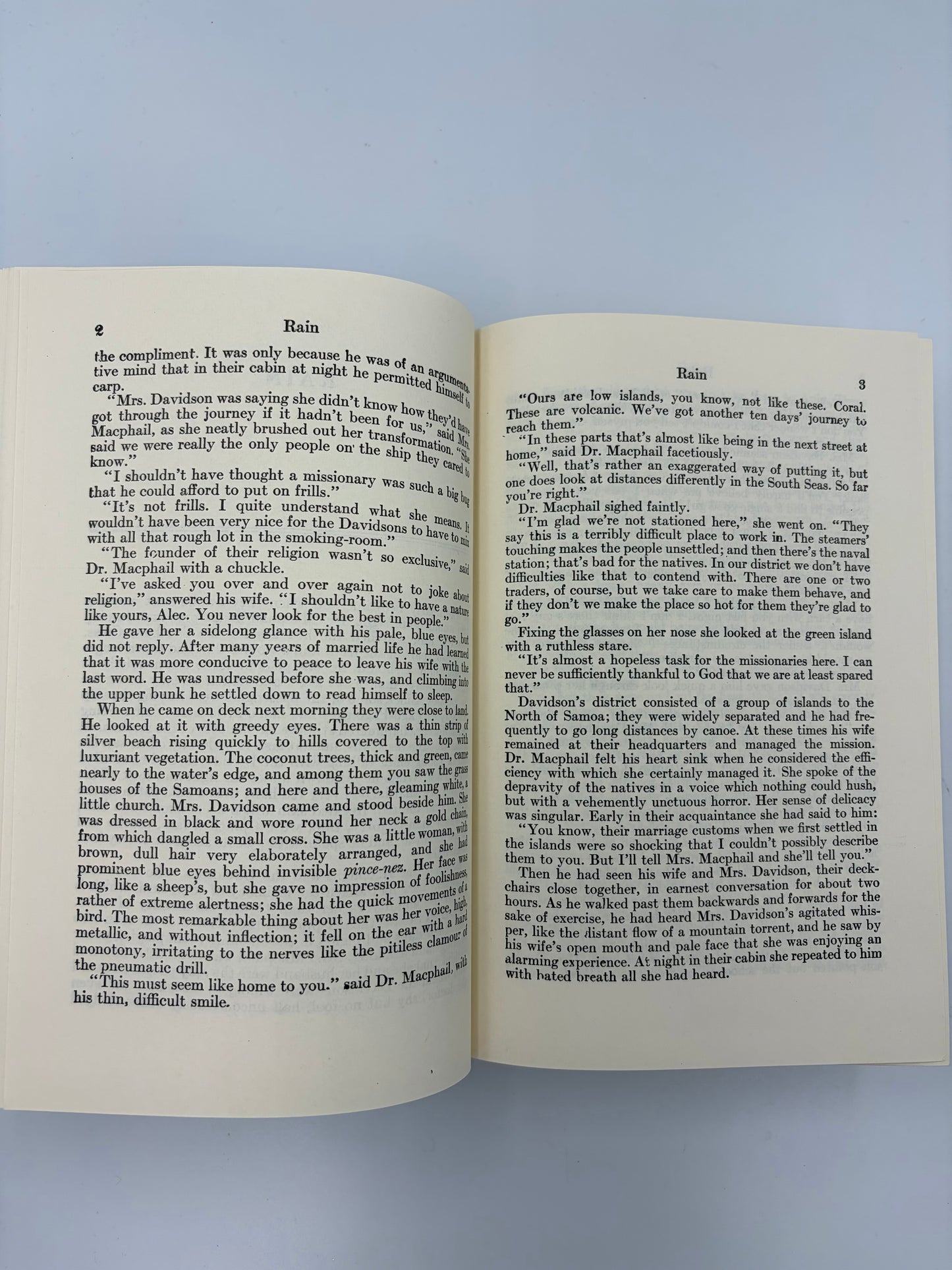 Open book with text continued form short story, 'The Rain' from 'The Complete Short Stories of W. Somerset Maugham' volume 1.