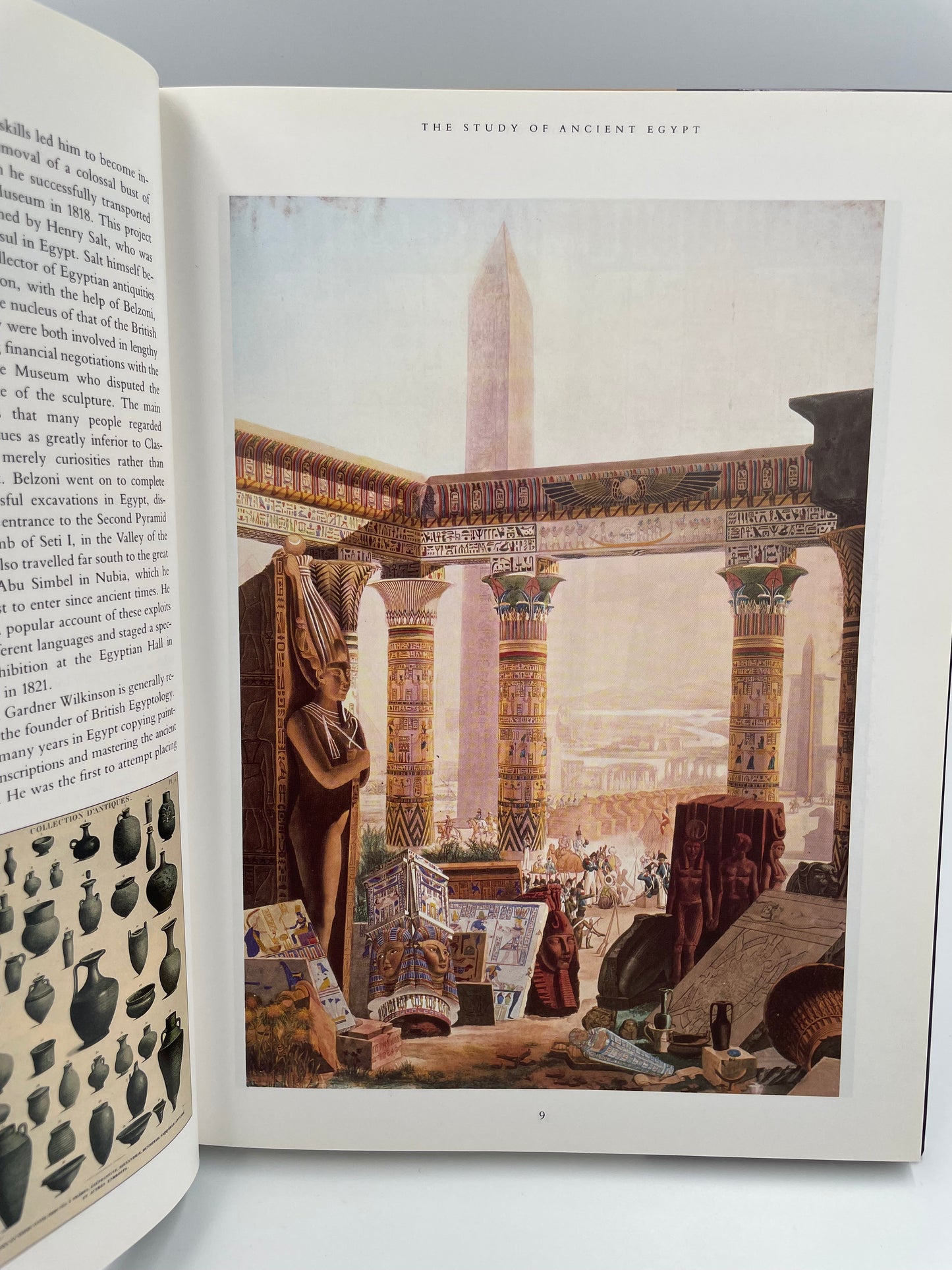 Open book with a detailed illustration of a architectural scene on a gray background from ‘Egyptology: An Introduction to the History, Culture, and Art of Ancient Egypt’ by James Putnam.