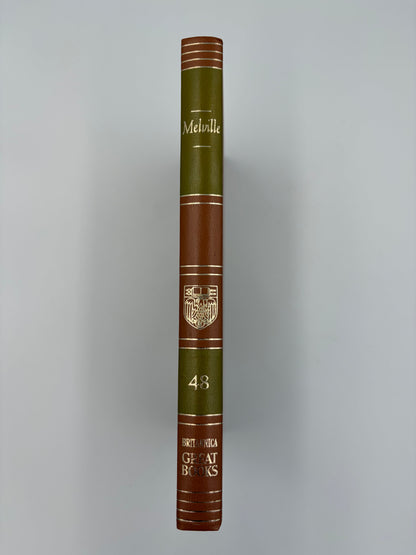 A hardcover edition of  ‘Moby-Dick; or, The Whale’ by Herman Melville standing upright.