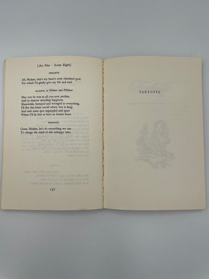 Open book with text and decorative elements on a gray background from ‘Molière: The Misanthrope and Tartuffe’.