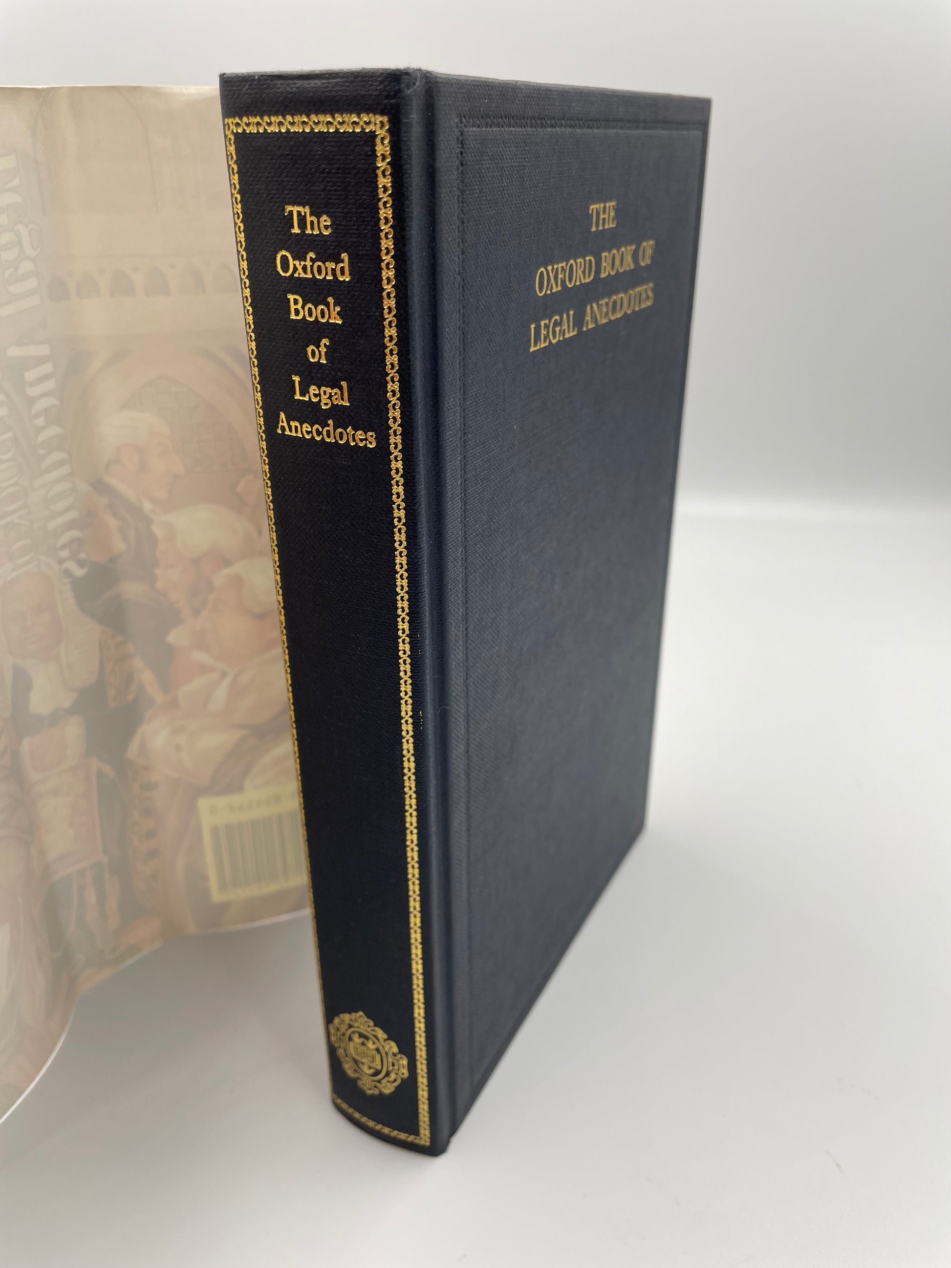 Book titled, The Oxford Book of Legal Anecdotes' without dust jacket and gold gilt lettering.  