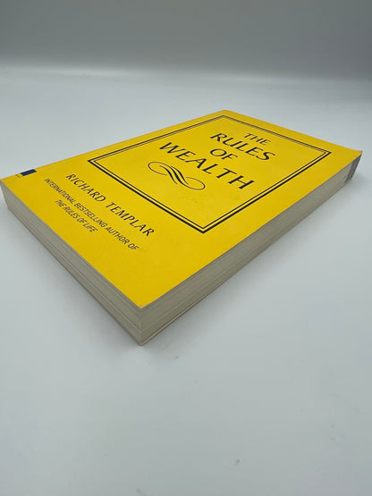 Book edges view of "The Rules of Wealth" by Richard Templar 