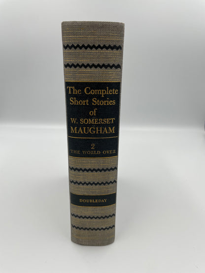 Book titled 'The Complete Short Stories of W. Somerset Maugham' on a white background