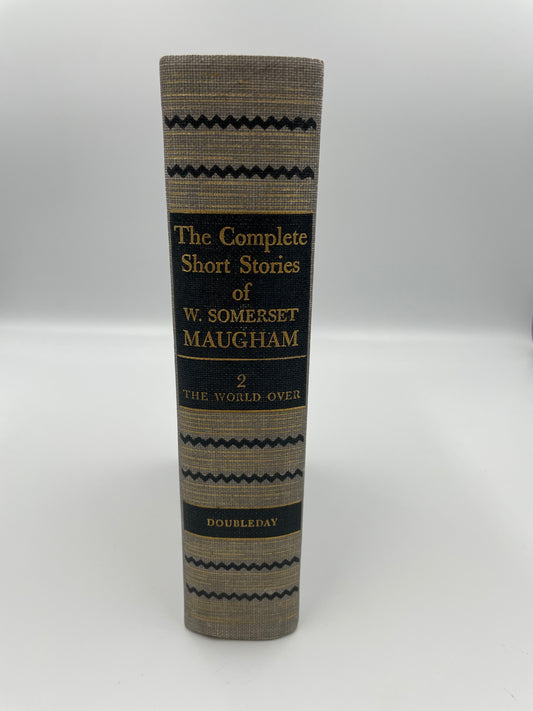 Book titled 'The Complete Short Stories of W. Somerset Maugham' on a white background
