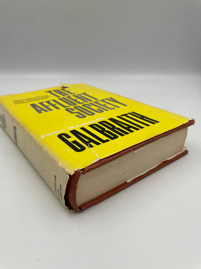 Side view of book, ‘The Affluent Society’ by John Kenneth Galbraith