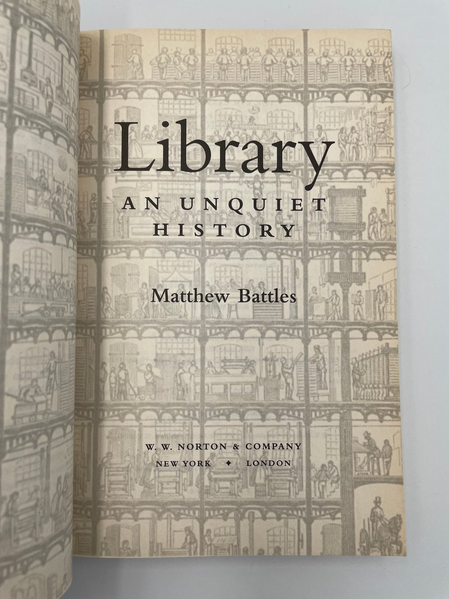 Title page of 'Library: An Unquiet History' by Matthew Battles with a decorative pattern.