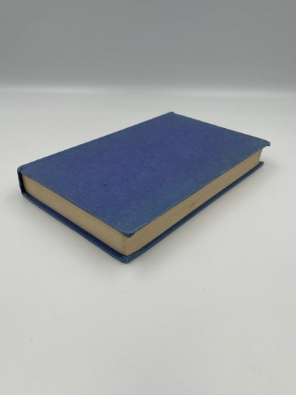 Blue book on a white background.