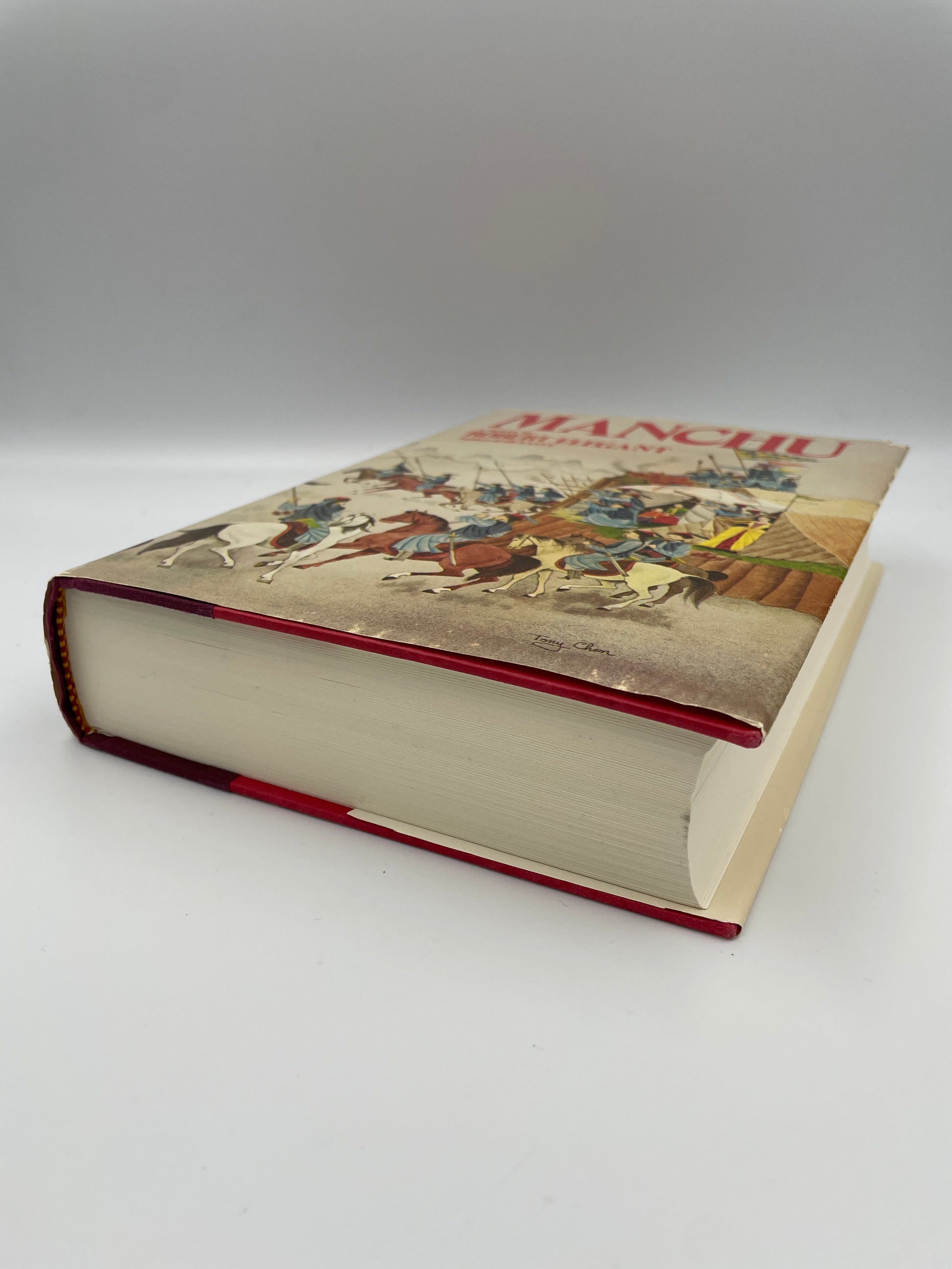 Book cover of "Manchu" by Rober Elegant pn its side.