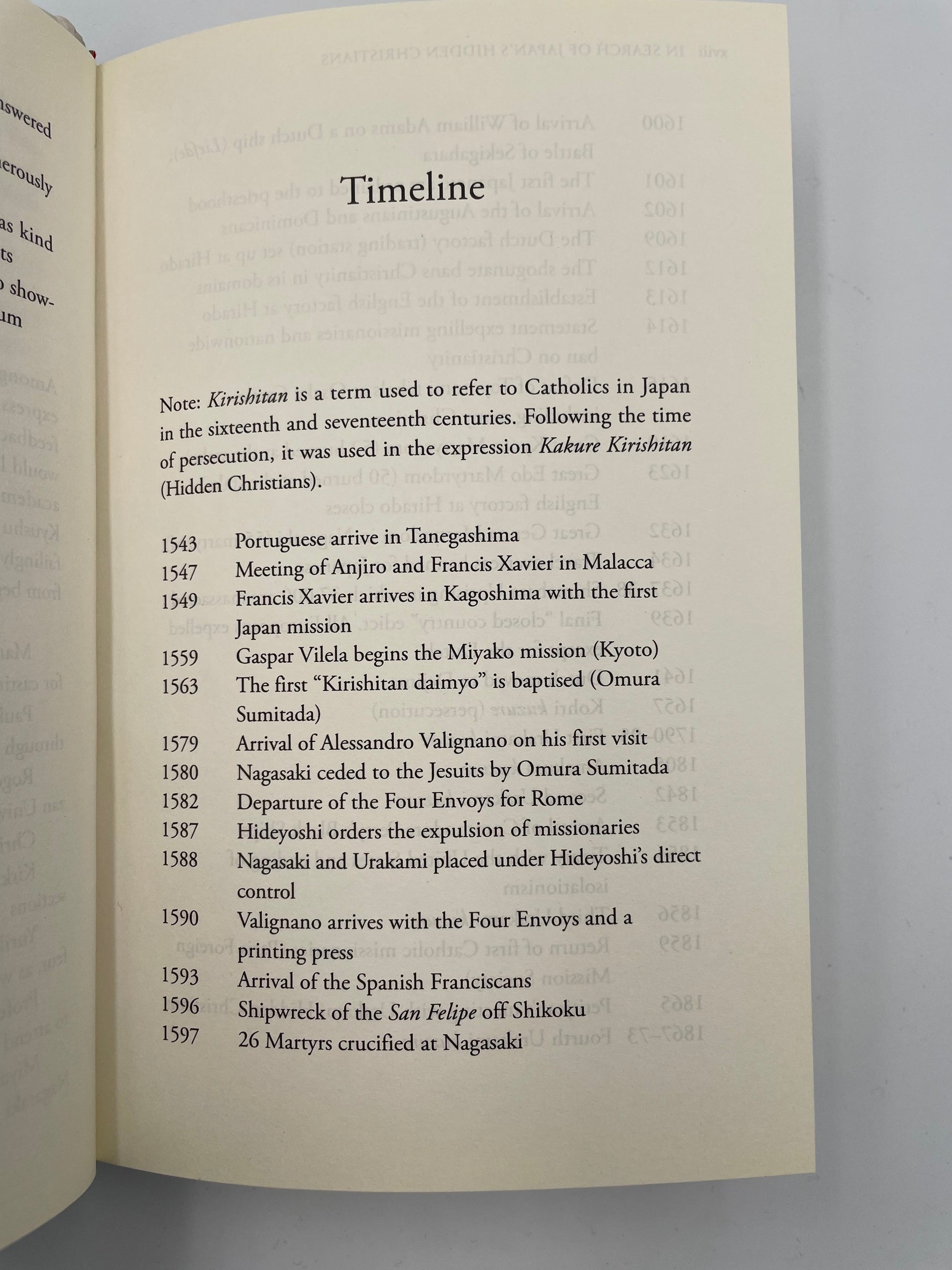 Page from 'In Search of Japan’s Hidden Christians' by John Dougill showing a timeline of historical events with text on a gray background.