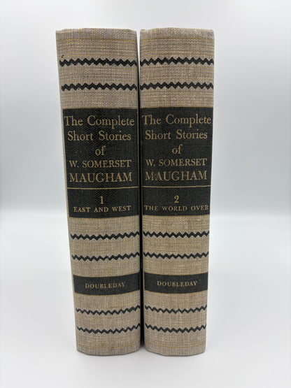 Two volume set titled 'The Complete Short Stories of W. Somerset Maugham', published by Doubleday on a white background.