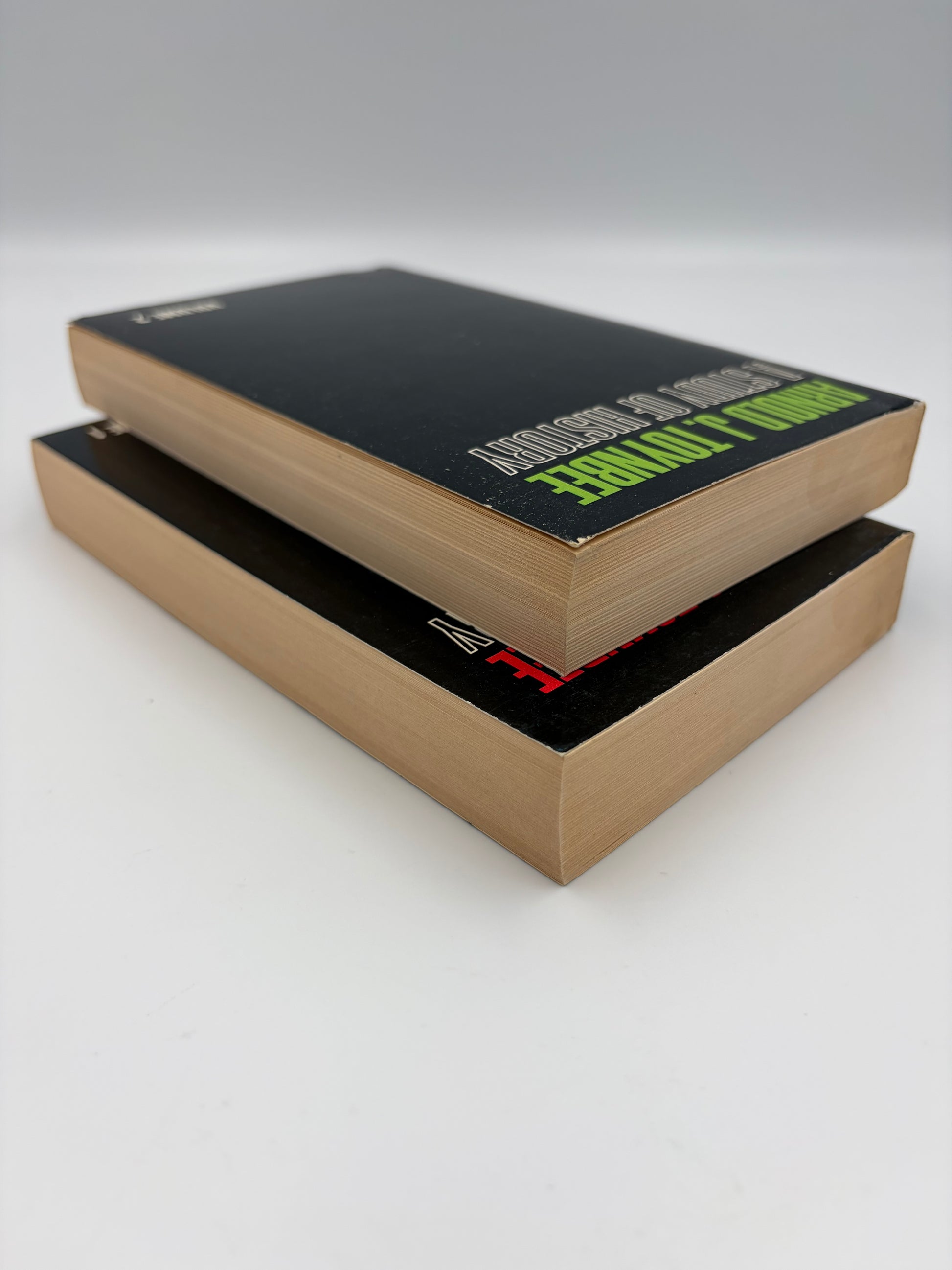 Two books stacked on top of one another