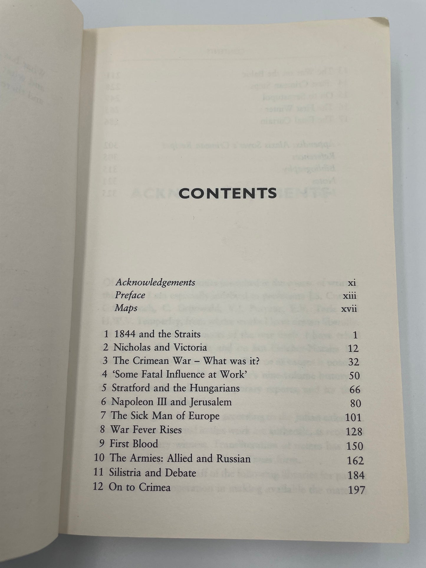 Open book showing a table of contents on a light gray background of ‘A Brief History of the Crimean War’ by Alexis Troubetzkoy