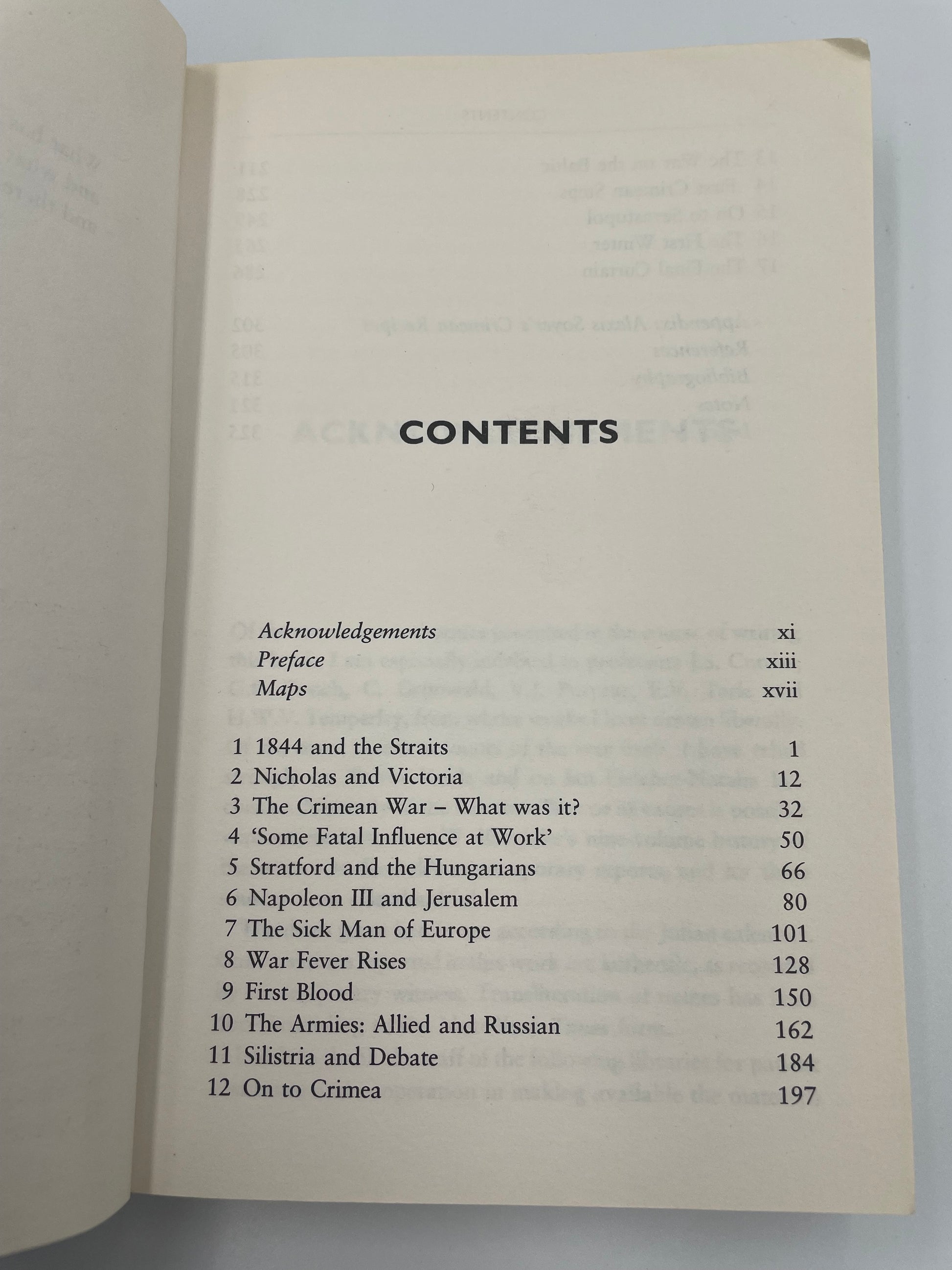 Open book showing a table of contents on a light gray background of ‘A Brief History of the Crimean War’ by Alexis Troubetzkoy