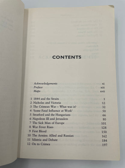 Open book showing a table of contents on a light gray background of ‘A Brief History of the Crimean War’ by Alexis Troubetzkoy