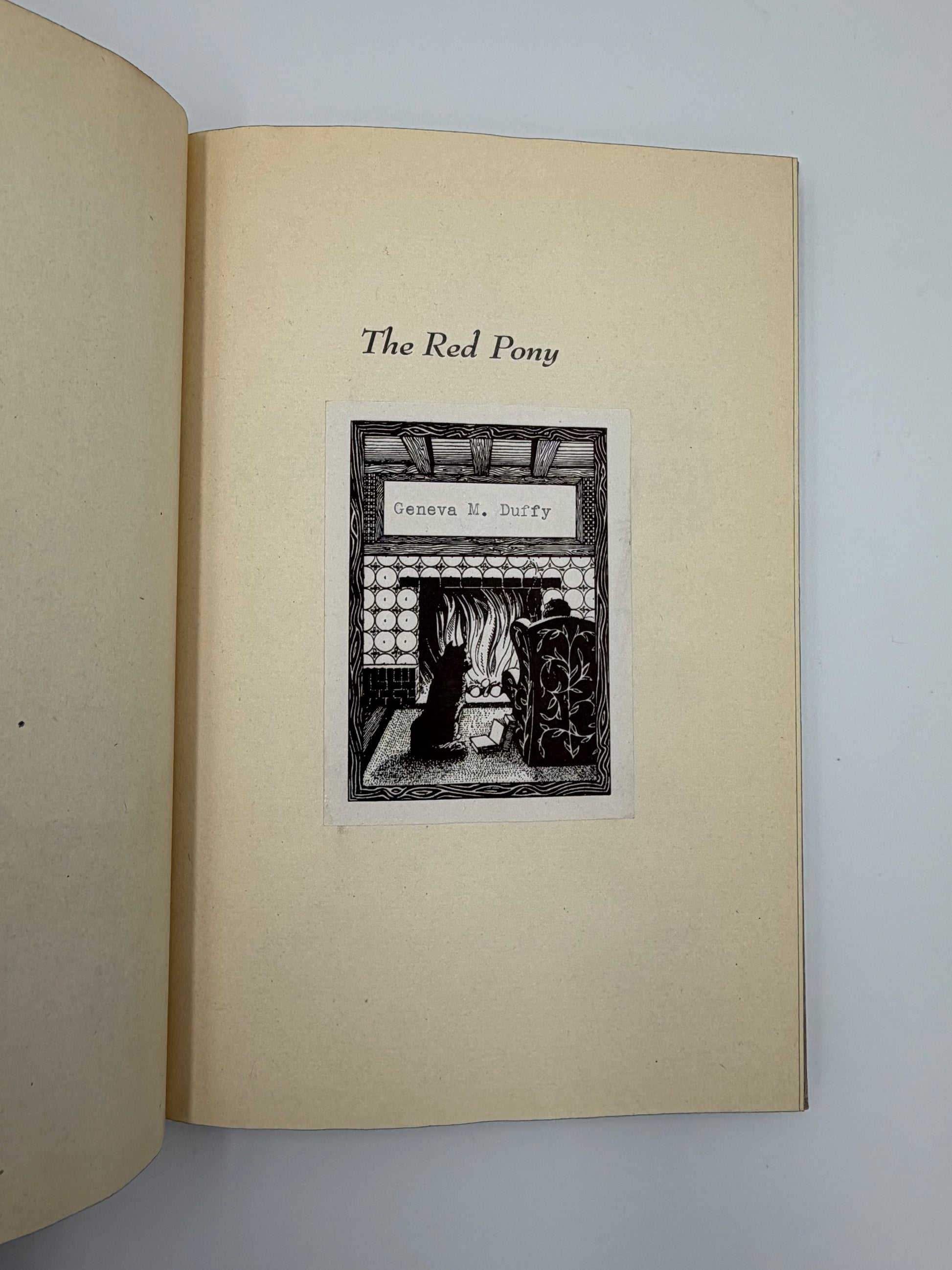 Old ex libris sticker on page from the book, 'The Red Pony' by John Steinbeck. 
